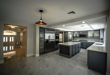 Luxury kitchen remodel with marble flooring and stainless steel appliances in South Pasadena
